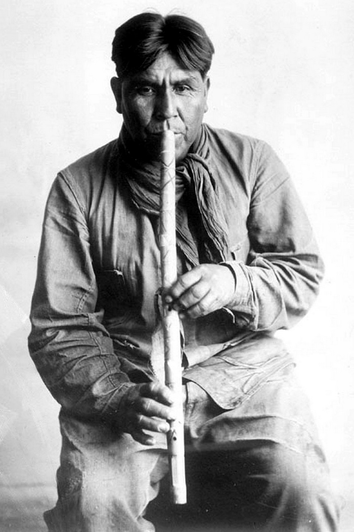 Cipriano Garcia playing a flute of the Tohono  Native American Flute